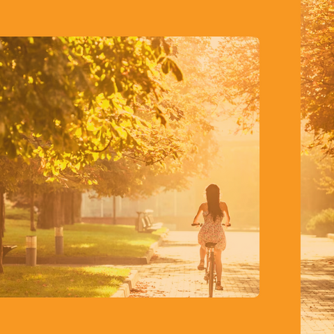 woman biking in a park related to environmental exposure