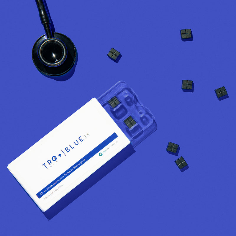 A box of Tro+ Blue and its troches next to a stethoscope