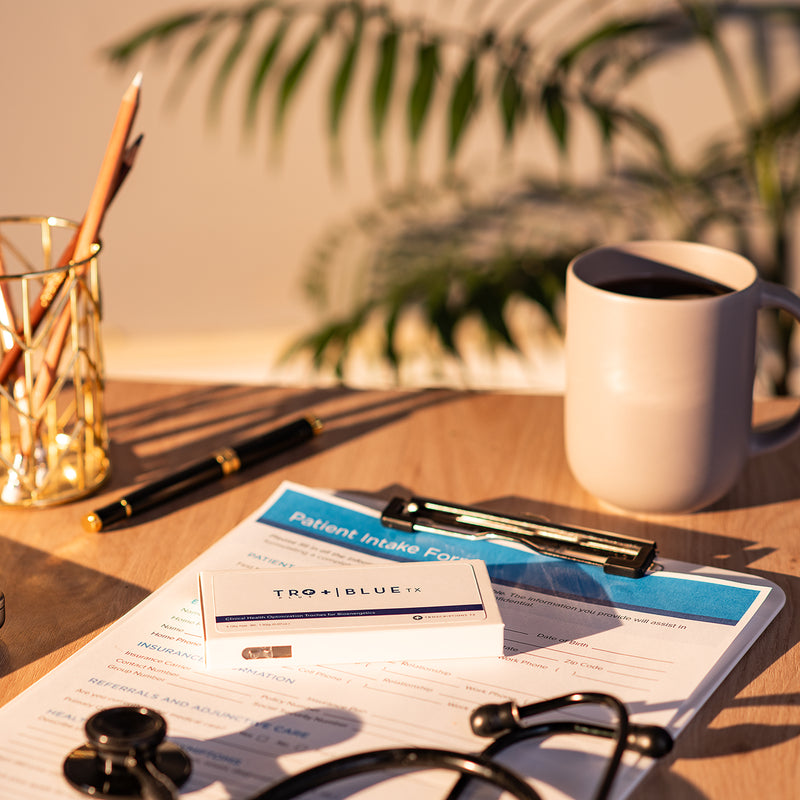 Tro+ Blue on top of a patient information form