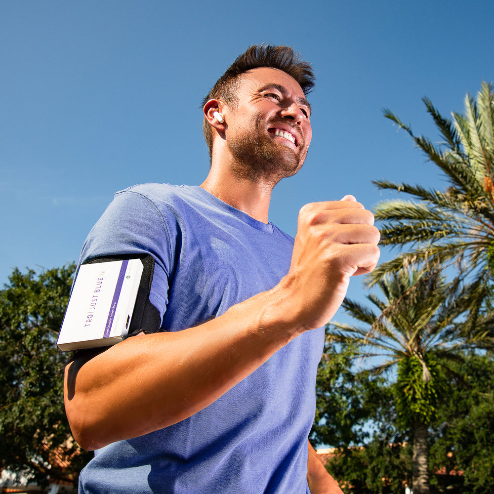 Man running outdoors with Just Blue